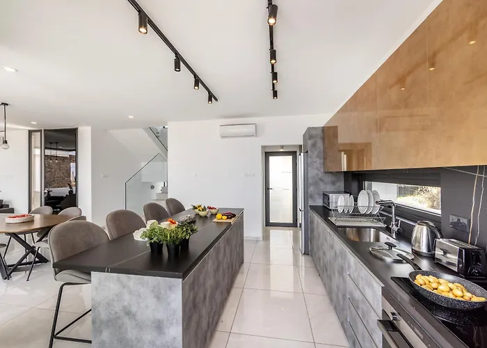 Pliades Case de vacanță